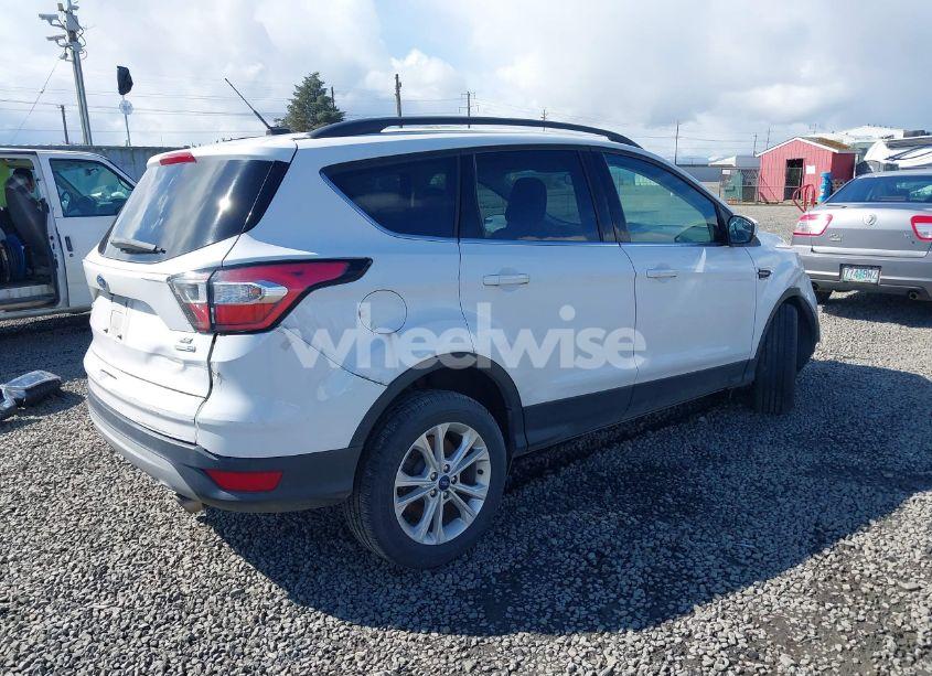 Photo 4 of 2018 Ford Escape SE (VIN 1FMCU9GD7JUC60951)