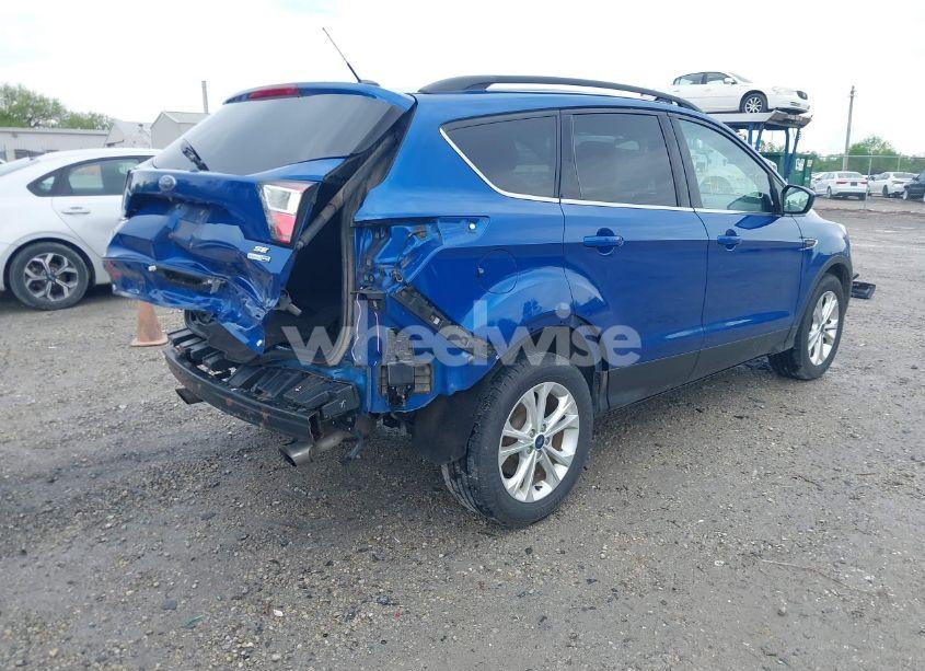 Photo 4 of 2017 Ford Escape SE (VIN 1FMCU9GD9HUB87656)