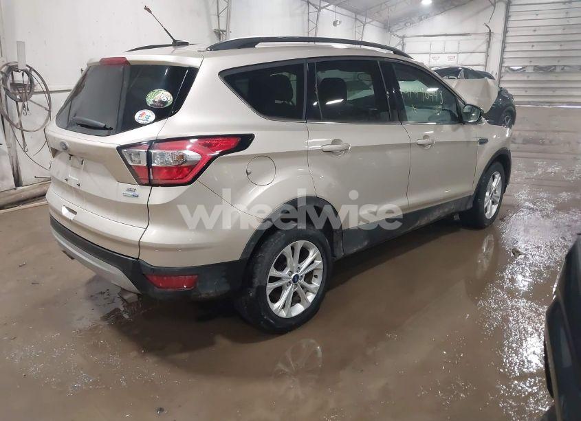 Photo 4 of 2017 Ford Escape SE (VIN 1FMCU9GD9HUE03991)