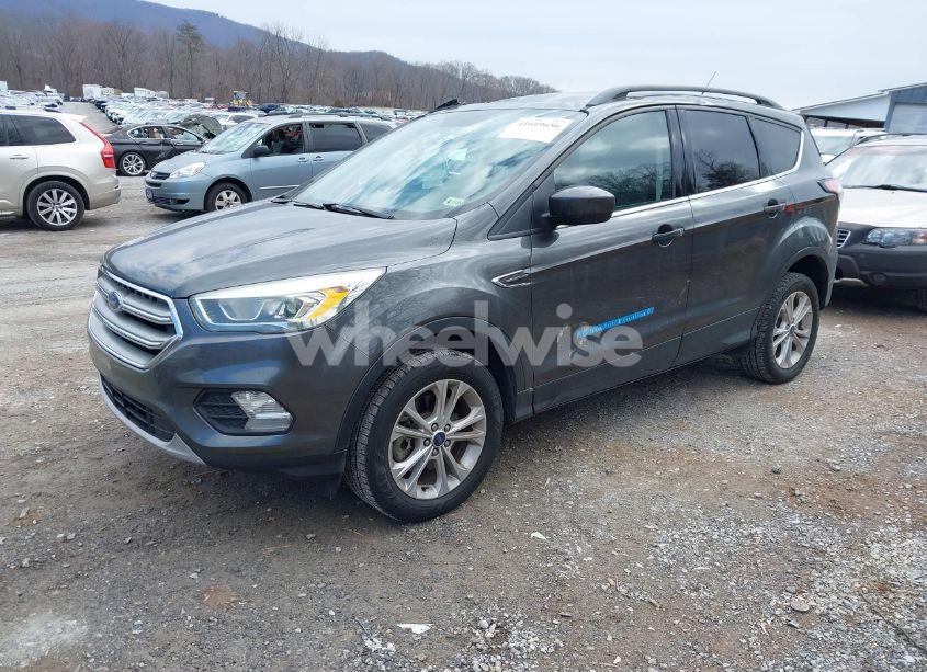 Photo 2 of 2017 Ford Escape SE (VIN 1FMCU9GD9HUE17311)