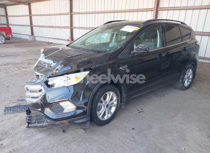 Photo 2 of 2017 Ford Escape SE (VIN 1FMCU9GD9HUE56044)