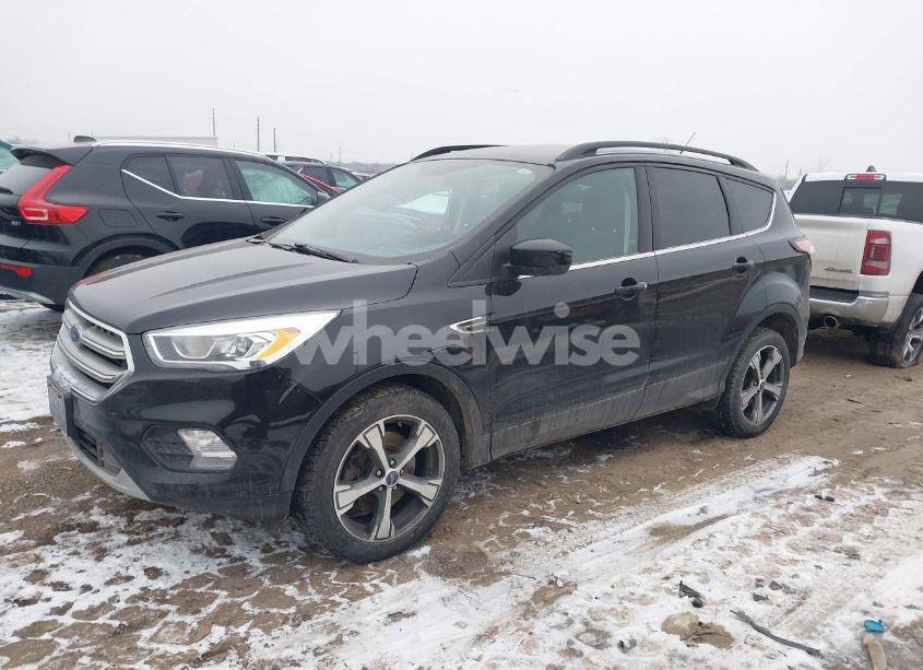 Photo 2 of 2017 Ford Escape SE (VIN 1FMCU9GDXHUD74100)