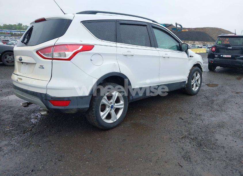 Photo 4 of 2016 Ford Escape SE (VIN 1FMCU9GX7GUB33507)