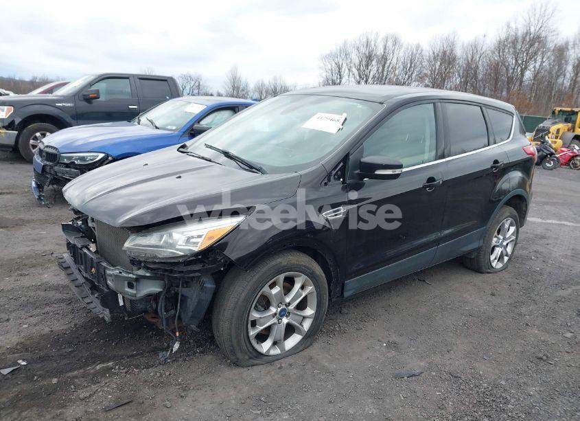 Photo 2 of 2013 Ford Escape SEL (VIN 1FMCU9HX1DUB77027)
