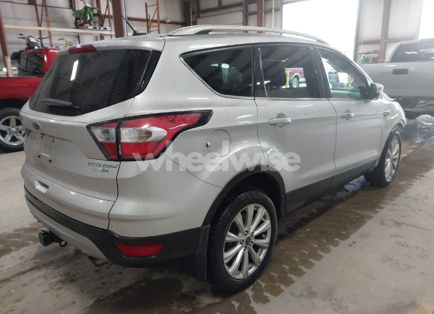 Photo 4 of 2017 Ford Escape TITANIUM (VIN 1FMCU9J90HUD09731)