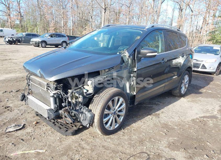 Photo 2 of 2017 Ford Escape TITANIUM (VIN 1FMCU9J90HUD55656)