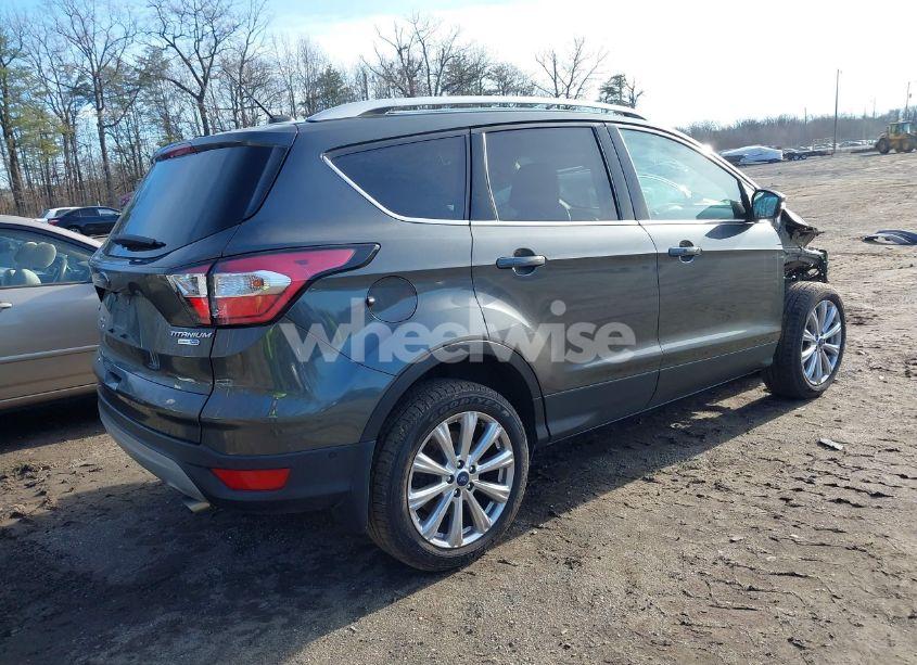 Photo 4 of 2017 Ford Escape TITANIUM (VIN 1FMCU9J90HUD55656)