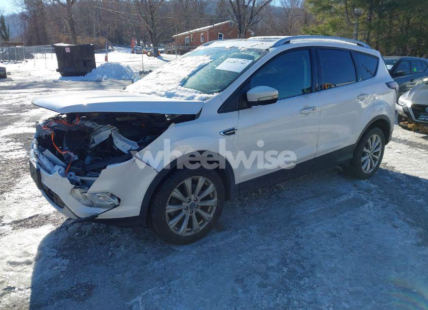 Photo 2 of 2017 Ford Escape TITANIUM (VIN 1FMCU9J90HUE32932)