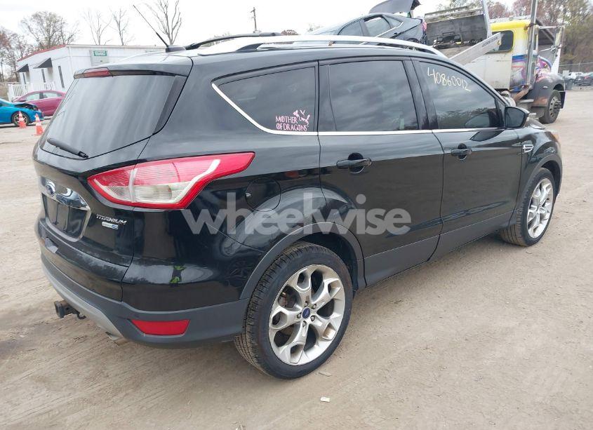 Photo 4 of 2016 Ford Escape TITANIUM (VIN 1FMCU9J91GUB04370)