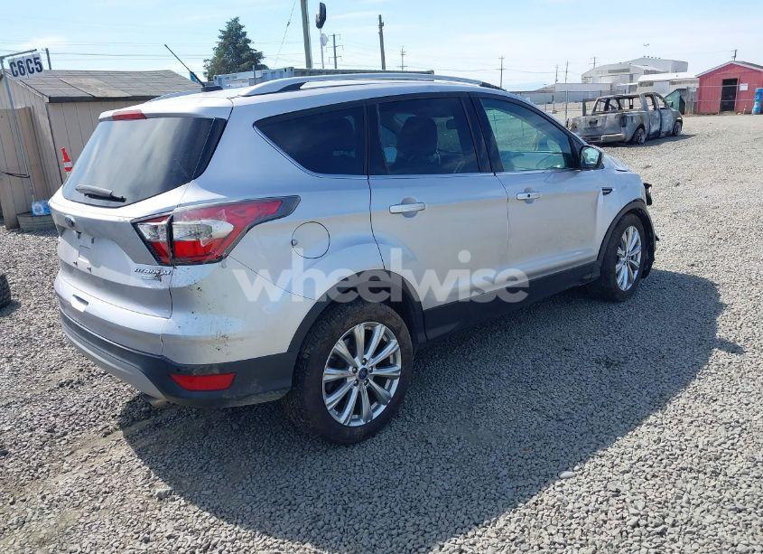 Photo 4 of 2017 Ford Escape TITANIUM (VIN 1FMCU9J91HUA32751)