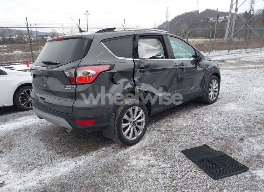 Photo 4 of 2017 Ford Escape TITANIUM (VIN 1FMCU9J91HUB74825)