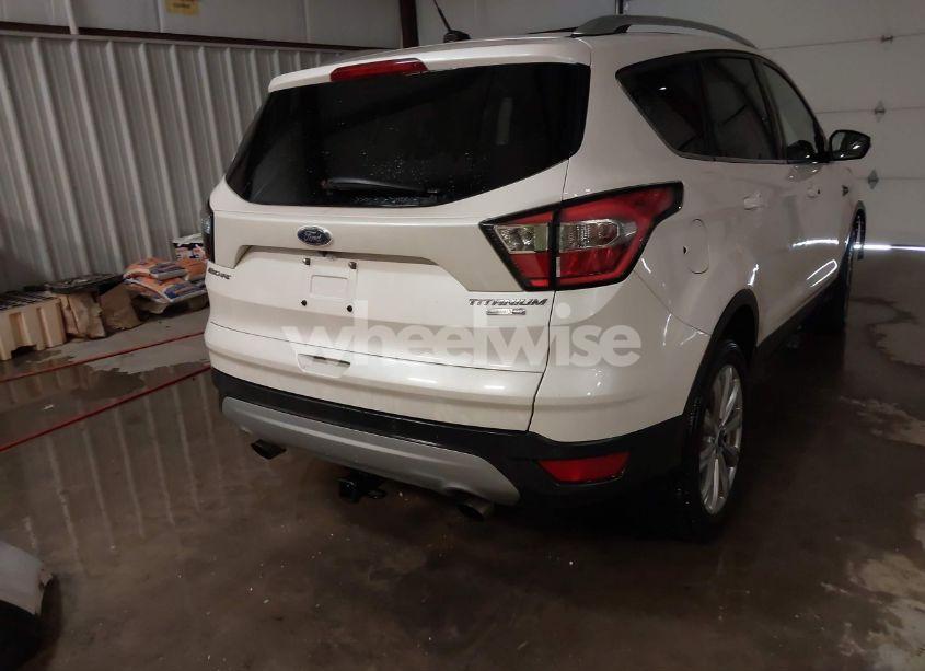 Photo 4 of 2017 Ford Escape TITANIUM (VIN 1FMCU9J92HUD78744)