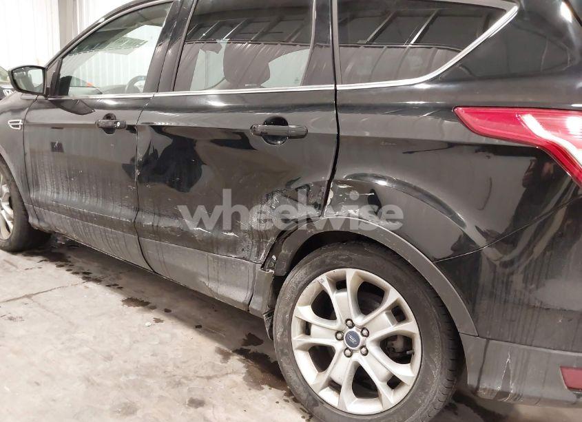 Photo 6 of 2016 Ford Escape TITANIUM (VIN 1FMCU9J93GUA77558)