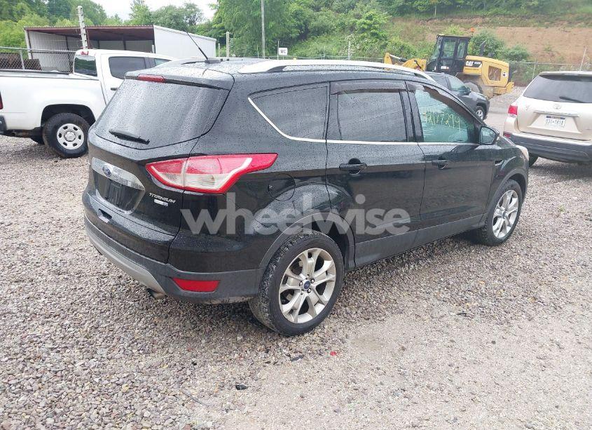 Photo 4 of 2016 Ford Escape TITANIUM (VIN 1FMCU9J93GUB93729)