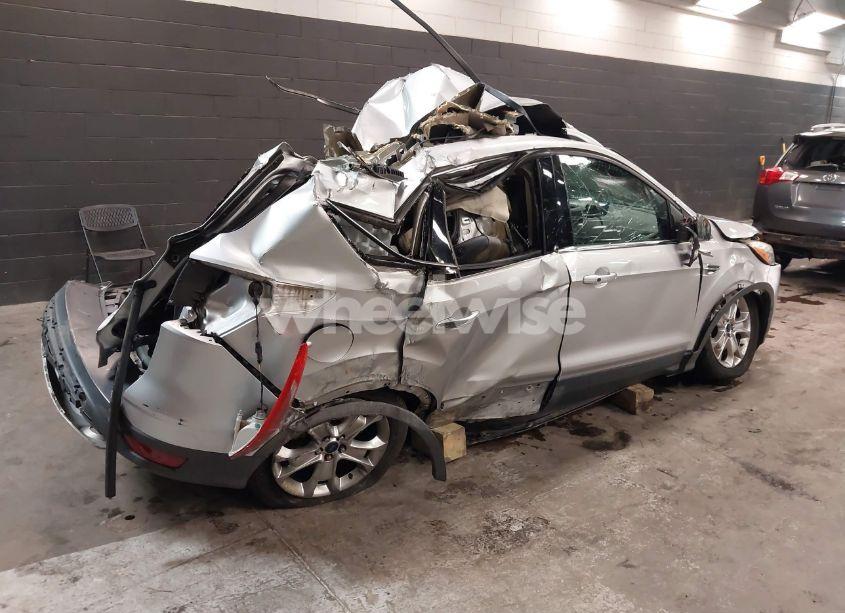 Photo 4 of 2016 Ford Escape TITANIUM (VIN 1FMCU9J94GUB00815)