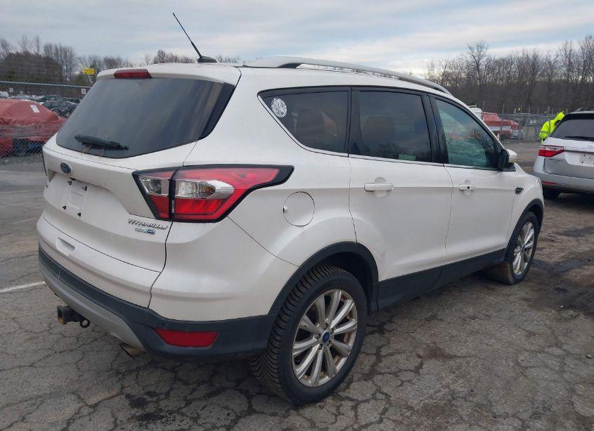 Photo 4 of 2017 Ford Escape TITANIUM (VIN 1FMCU9J94HUC70125)