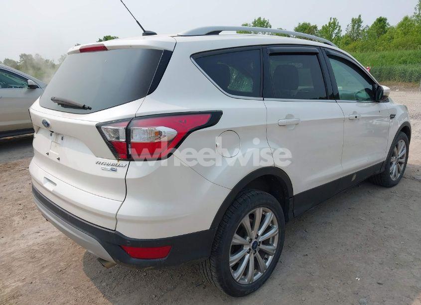 Photo 4 of 2017 Ford Escape TITANIUM (VIN 1FMCU9J94HUD33448)