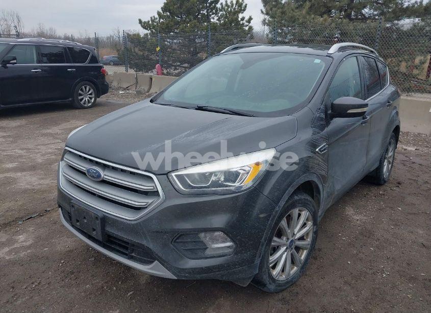 Photo 2 of 2017 Ford Escape TITANIUM (VIN 1FMCU9J94HUD49939)