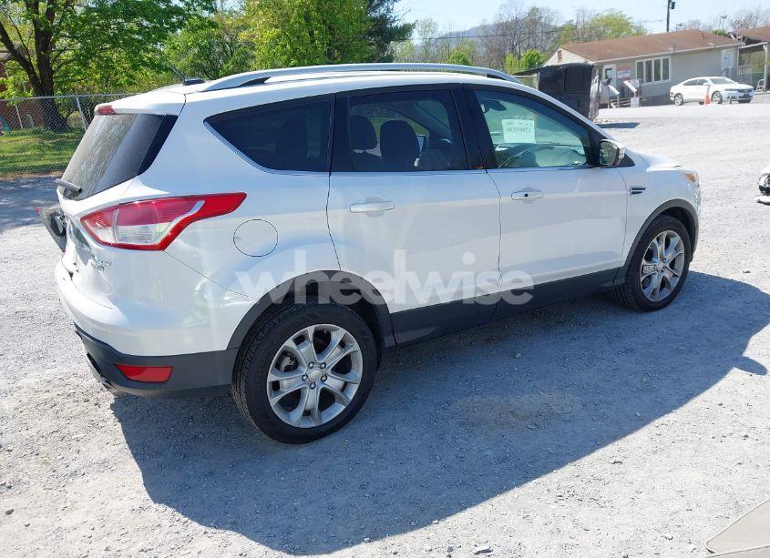 Photo 4 of 2016 Ford Escape TITANIUM (VIN 1FMCU9J95GUC52053)