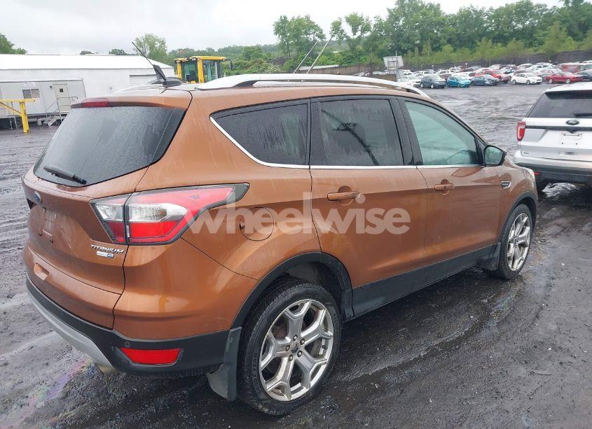 Photo 4 of 2017 Ford Escape TITANIUM (VIN 1FMCU9J95HUA02328)