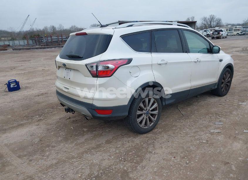Photo 4 of 2017 Ford Escape TITANIUM (VIN 1FMCU9J95HUA19100)
