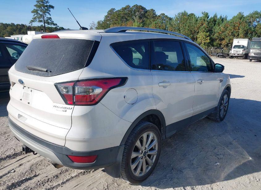 Photo 4 of 2017 Ford Escape TITANIUM (VIN 1FMCU9J95HUB91031)