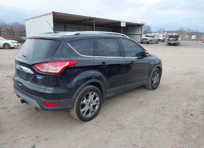 Photo 4 of 2016 Ford Escape TITANIUM (VIN 1FMCU9J96GUB67884)