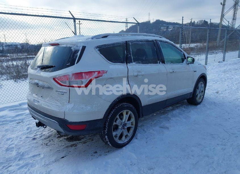 Photo 4 of 2016 Ford Escape TITANIUM (VIN 1FMCU9J96GUC53065)