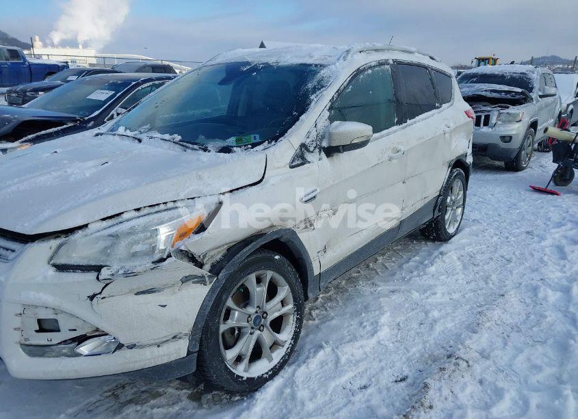 Photo 6 of 2016 Ford Escape TITANIUM (VIN 1FMCU9J96GUC53065)