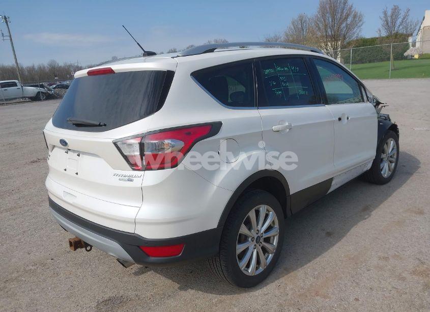 Photo 4 of 2017 Ford Escape TITANIUM (VIN 1FMCU9J96HUA77734)
