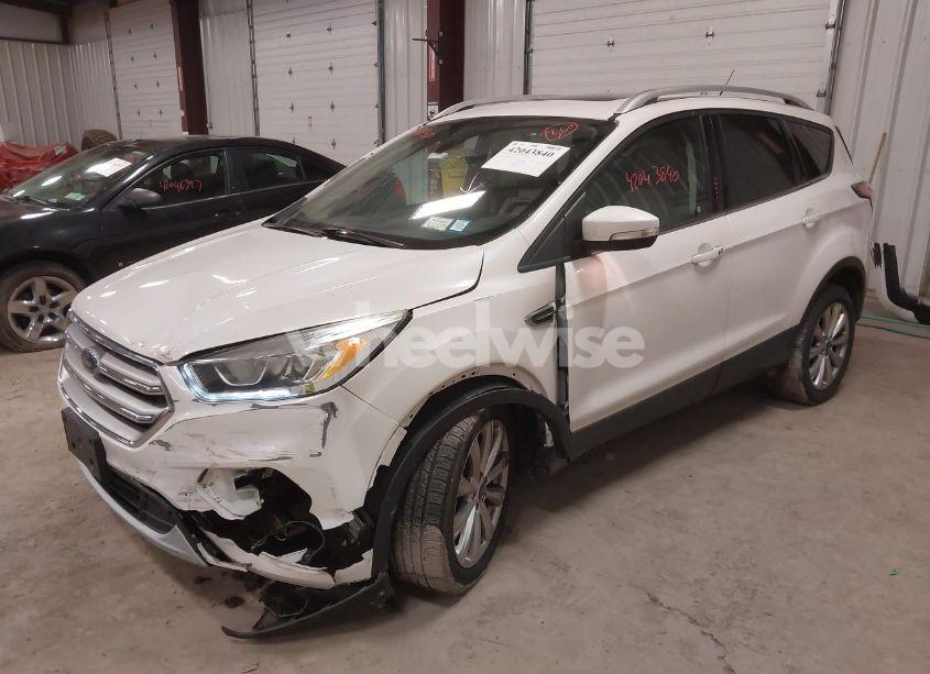 Photo 2 of 2017 Ford Escape TITANIUM (VIN 1FMCU9J96HUB13454)