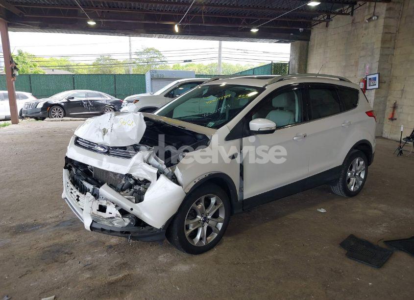 Photo 2 of 2016 Ford Escape TITANIUM (VIN 1FMCU9J97GUC32516)