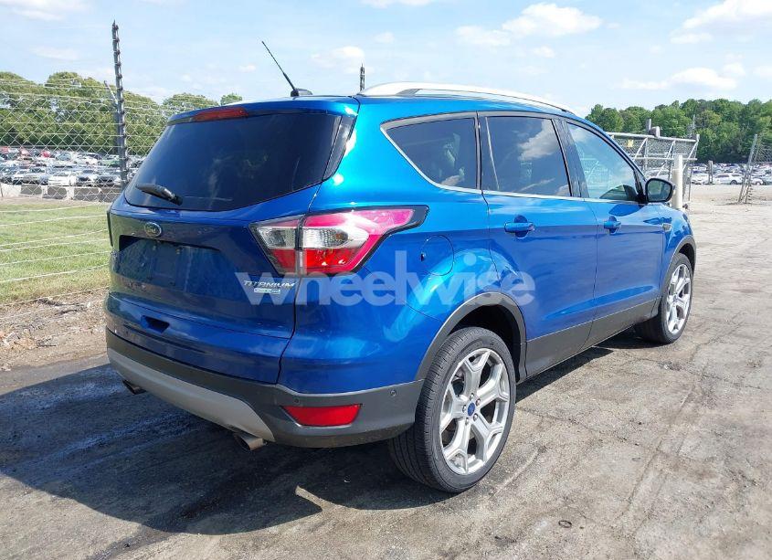 Photo 4 of 2017 Ford Escape TITANIUM (VIN 1FMCU9J97HUA57671)