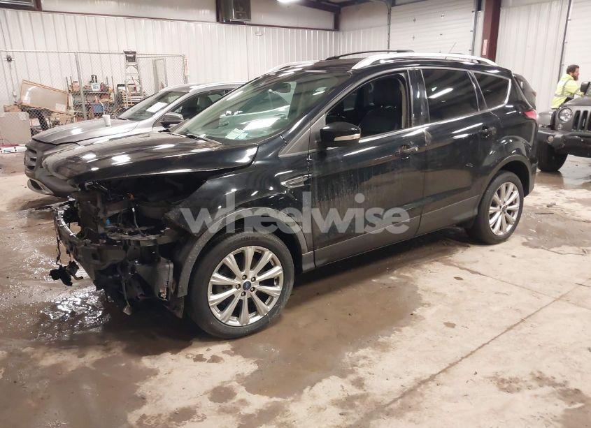 Photo 2 of 2017 Ford Escape TITANIUM (VIN 1FMCU9J97HUD73054)