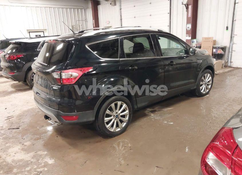Photo 4 of 2017 Ford Escape TITANIUM (VIN 1FMCU9J97HUD73054)