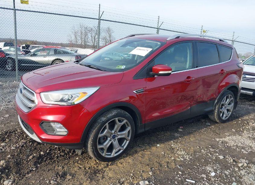 Photo 2 of 2017 Ford Escape TITANIUM (VIN 1FMCU9J98HUA11668)