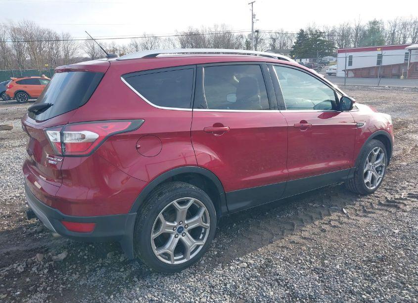 Photo 4 of 2017 Ford Escape TITANIUM (VIN 1FMCU9J98HUA11668)