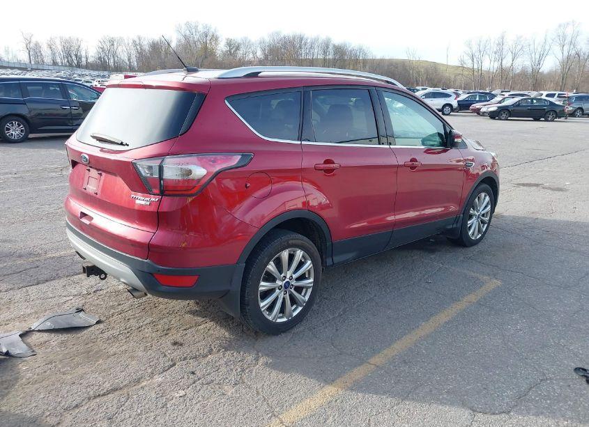 Photo 4 of 2017 Ford Escape TITANIUM (VIN 1FMCU9J99HUA60670)