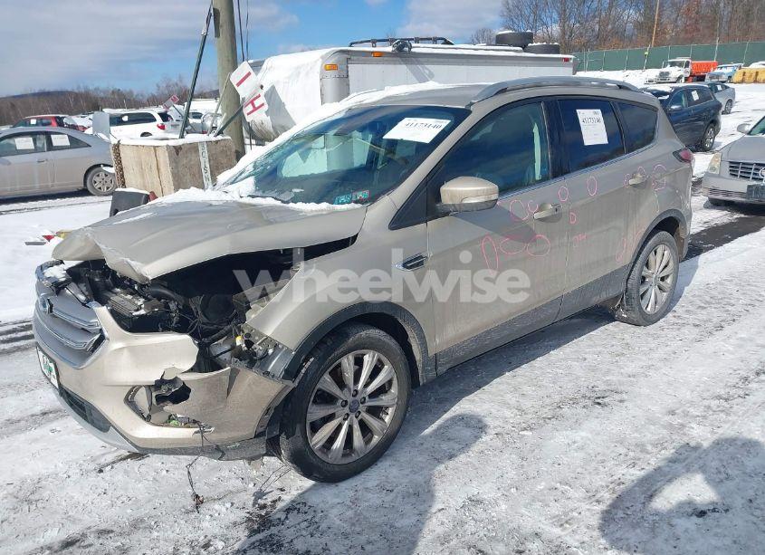 Photo 2 of 2017 Ford Escape TITANIUM (VIN 1FMCU9J99HUD37317)