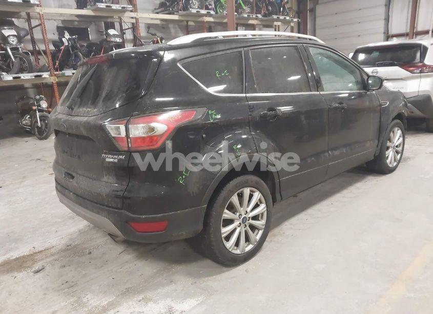 Photo 4 of 2017 Ford Escape TITANIUM (VIN 1FMCU9J9XHUB51401)