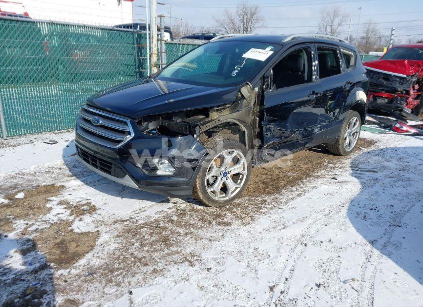 Photo 2 of 2017 Ford Escape TITANIUM (VIN 1FMCU9J9XHUD07758)