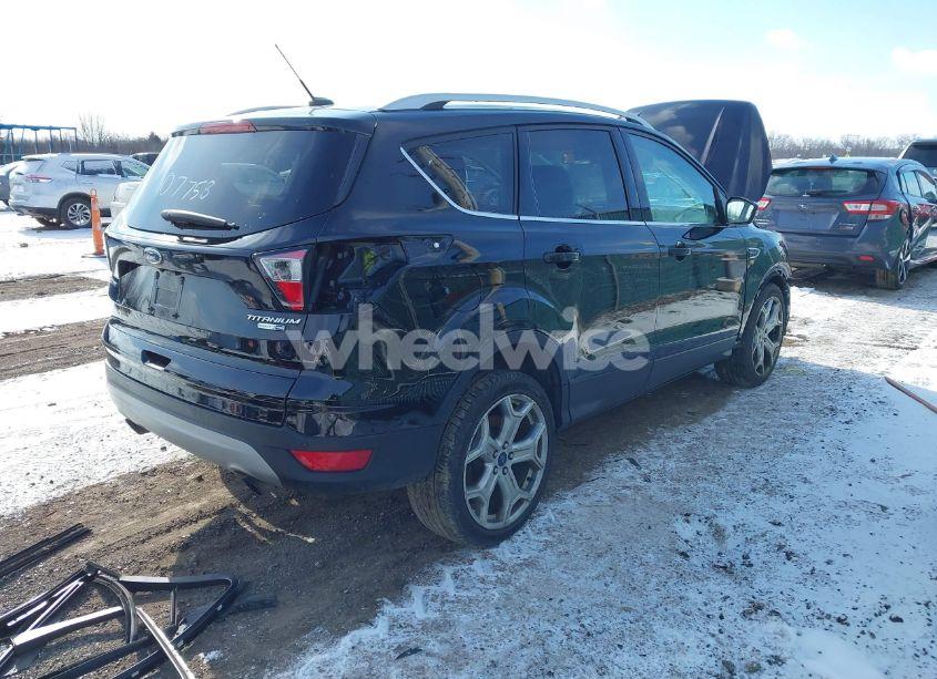 Photo 4 of 2017 Ford Escape TITANIUM (VIN 1FMCU9J9XHUD07758)
