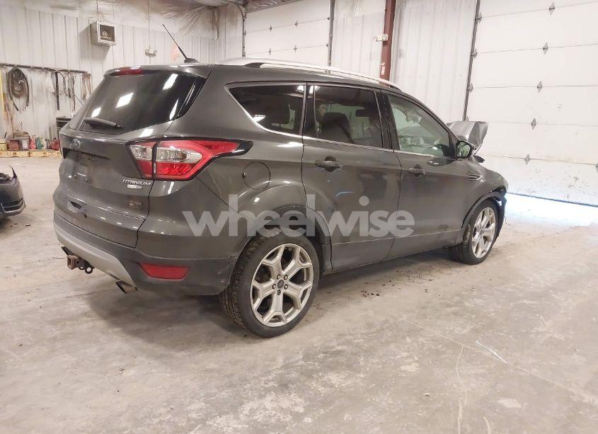 Photo 4 of 2017 Ford Escape TITANIUM (VIN 1FMCU9J9XHUD37682)