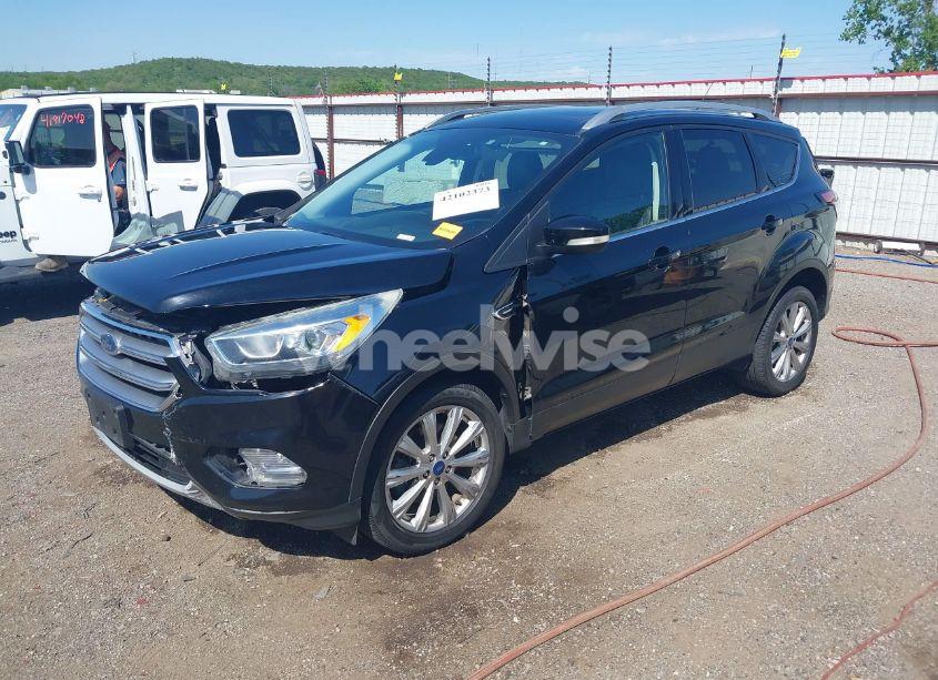 Photo 2 of 2017 Ford Escape TITANIUM (VIN 1FMCU9J9XHUD76420)
