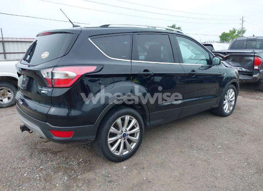 Photo 4 of 2017 Ford Escape TITANIUM (VIN 1FMCU9J9XHUD76420)