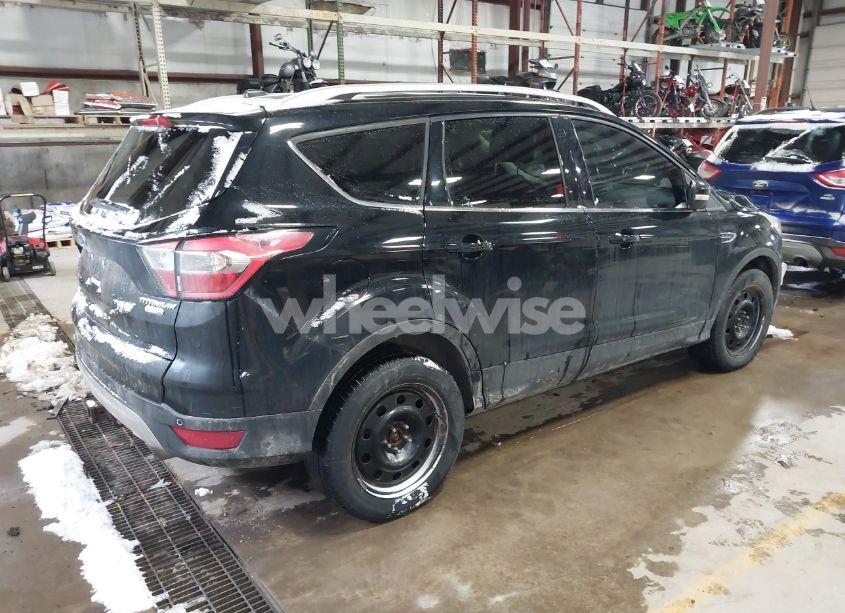 Photo 4 of 2017 Ford Escape TITANIUM (VIN 1FMCU9J9XHUE80924)