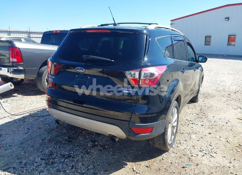 Photo 4 of 2017 Ford Escape TITANIUM (VIN 1FMCU9JD6HUC31329)