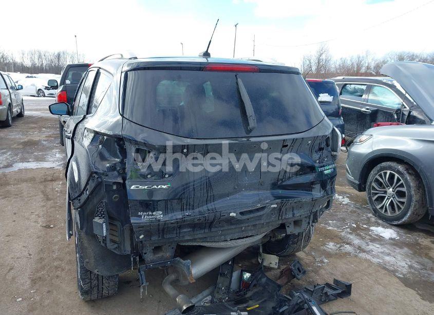 Photo 6 of 2017 Ford Escape TITANIUM (VIN 1FMCU9JD9HUE03417)