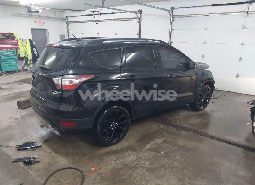 Photo 4 of 2017 Ford Escape TITANIUM (VIN 1FMCU9JDXHUD16223)