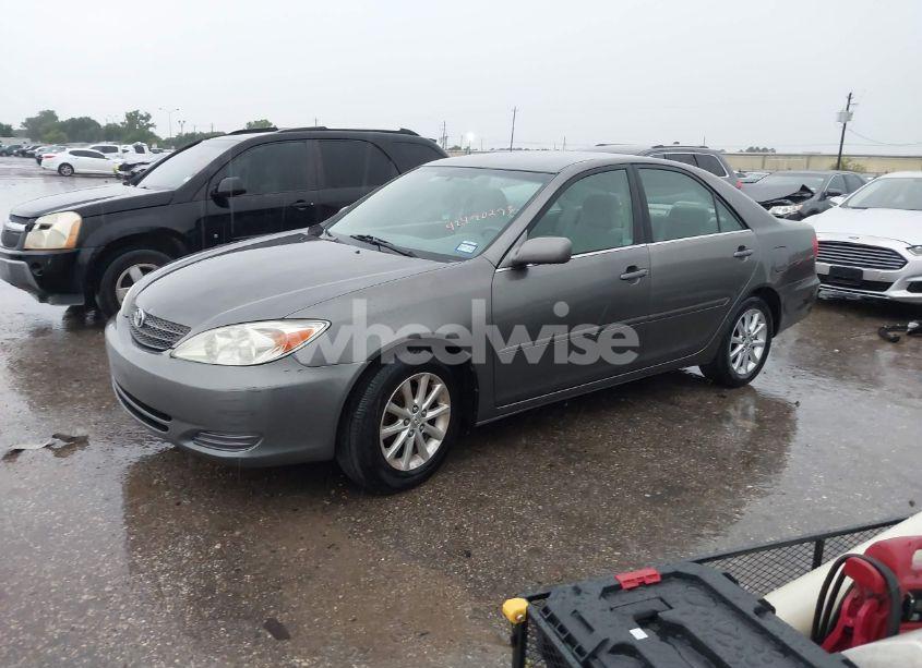 Photo 2 of 2002 Toyota Camry LE (VIN 1FMHK8B85CG******)